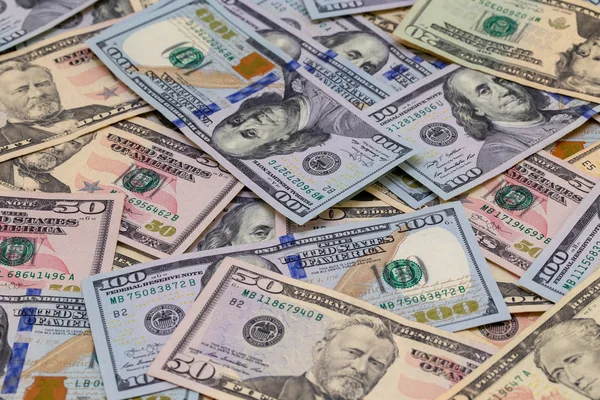 Dolarlarına arka plan. Amerikan Doları nakit para. Yüz dolar, on dolar banknotlar. Yüz dolar. Benjamin Franklin'in portresi