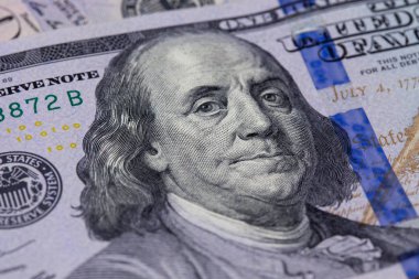 100 Doları closeup bill. Dolarlarına arka plan. Amerikan Doları nakit para. Benjamin Franklin'in portresi