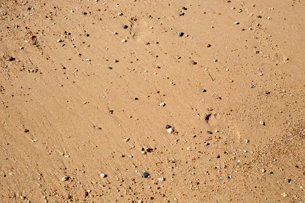 Sand konsistens på stranden. Naturlig bakgrund. — Stockfoto