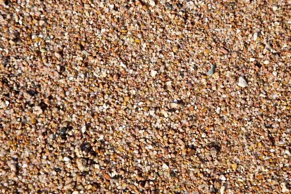 Het patroon van de zand op het strand. Natuurlijke achtergrond. — Stockfoto