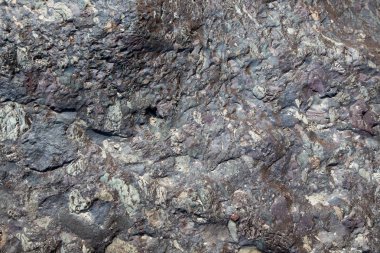 Doğal taş dokusu. Güzel mermer arka plan. Renkli taş doku detayı. İlginç doğal desen.