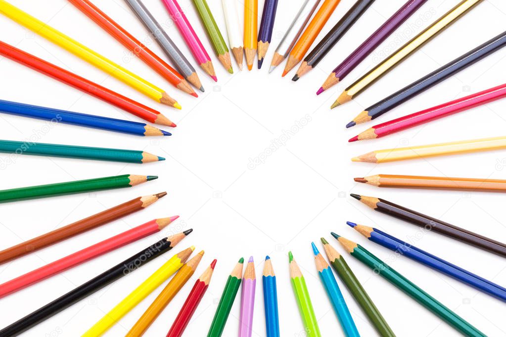 Colour pencils isolated on white background. Wood texture pencil with sharpening shavings on white background pencil on table, the blogger instrument. copyspace, space for text.