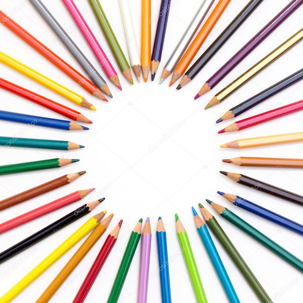 Colour pencils isolated on white background. Wood texture pencil with sharpening shavings on white background pencil on table, the blogger instrument. copyspace, space for text.
