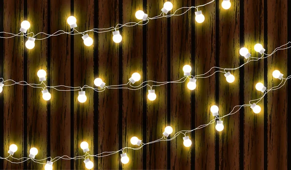 Christmas lights isolated on dark wooden background. Glow garland. Vector glow xmas light bulbs on wires. — Stock Vector