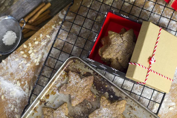 Christmas Cookies Gift ready for friendsFamily Christmas Cookies out of Oven for friends and kids with powder sugar