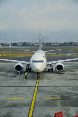 Uçak yolcuları yatılı Havaalanı.