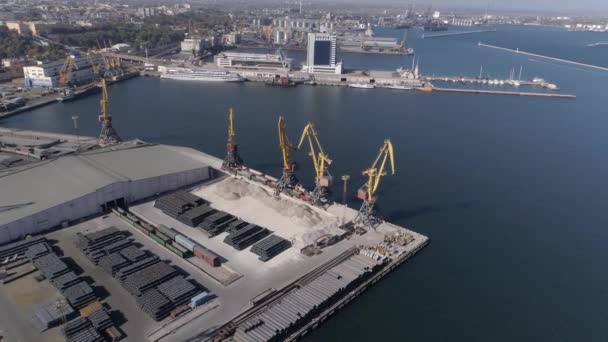 Port industry during building with Construction Materials and lifting cranes on Black Sea quay, Top view — Stock Video