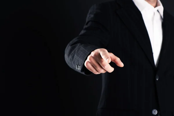 Hombre Negocios Señalando Con Dedo Sobre Fondo Oscuro —  Fotos de Stock