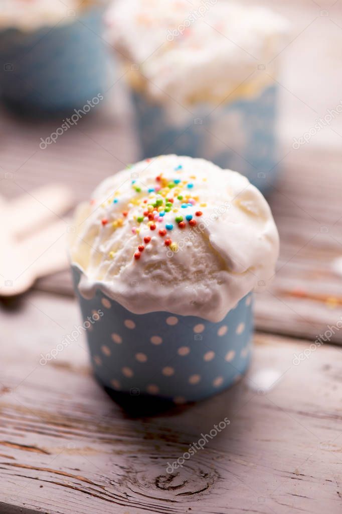 Soft delicious vanila icecream on a table