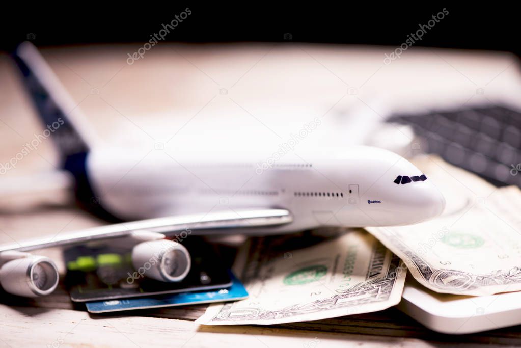 Aircraft banknotes on a notebook. Travelling concept