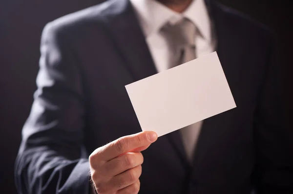 Businessman showing his visiting card