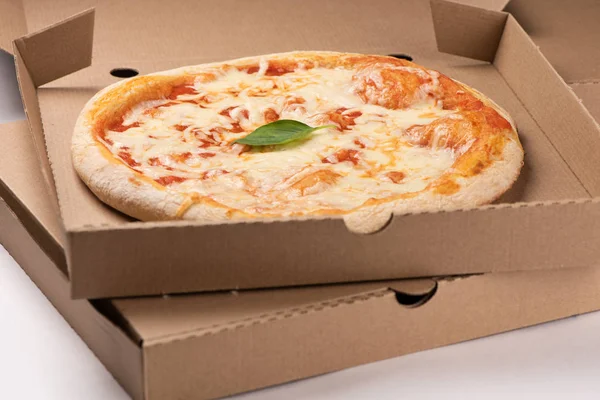 Pizza in a cardboard box