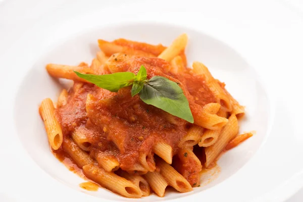 Penne pasta in tomato sauce Stock Image