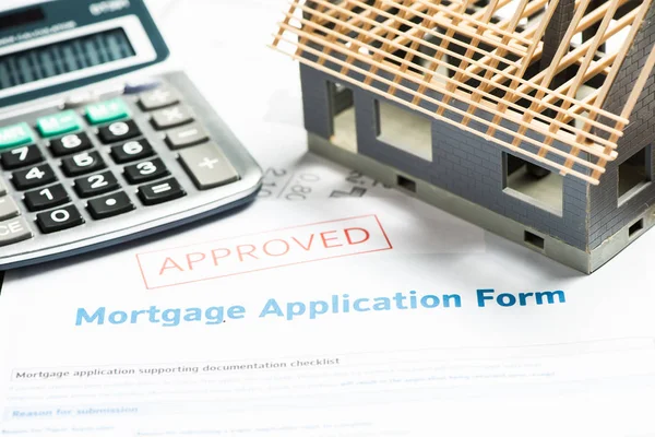 Approved mortgage loan agreement application. Close.