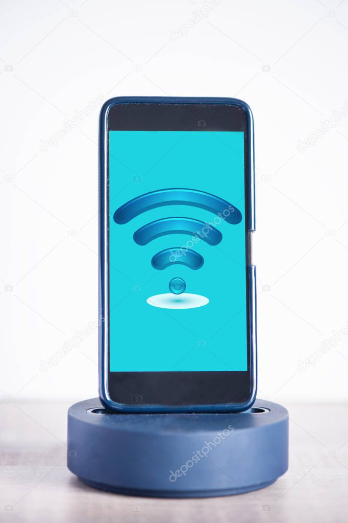 Free wifi connection on mobile phone screen. Internet and teleco