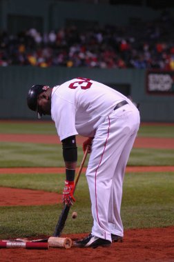 Boston Red Sox slugger David Ortiz in action in 2005 against the Atlanta Braves in Fenway Park, Boston, MA.  clipart