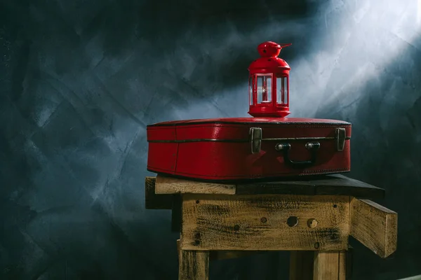 Red Suitcase Red Candlestick Dark Background — Stock Photo, Image