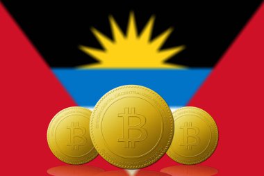 Arka planda Antigua ve Barbuda bayrağı olan üç Bitcoin kripto para birimi.