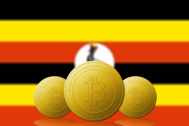 Arka planda Uganda bayrağı olan üç Bitcoin kripto para birimi.