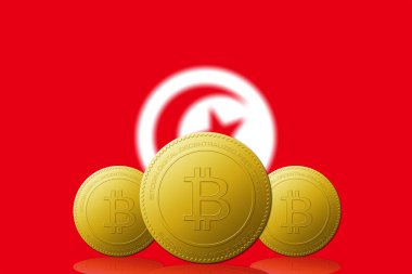 Arka planda Tunus bayrağı bulunan üç Bitcoin kripto para birimi.