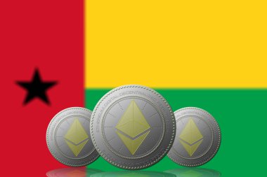 Arka planda Gine Bissau bayrağı bulunan üç ETHEREUM şifrelemesi.