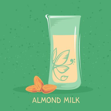 Badem süt cam üzerinde yeşil arka plan izole. Organik Gıda ve sağlık gıda sembolleri.