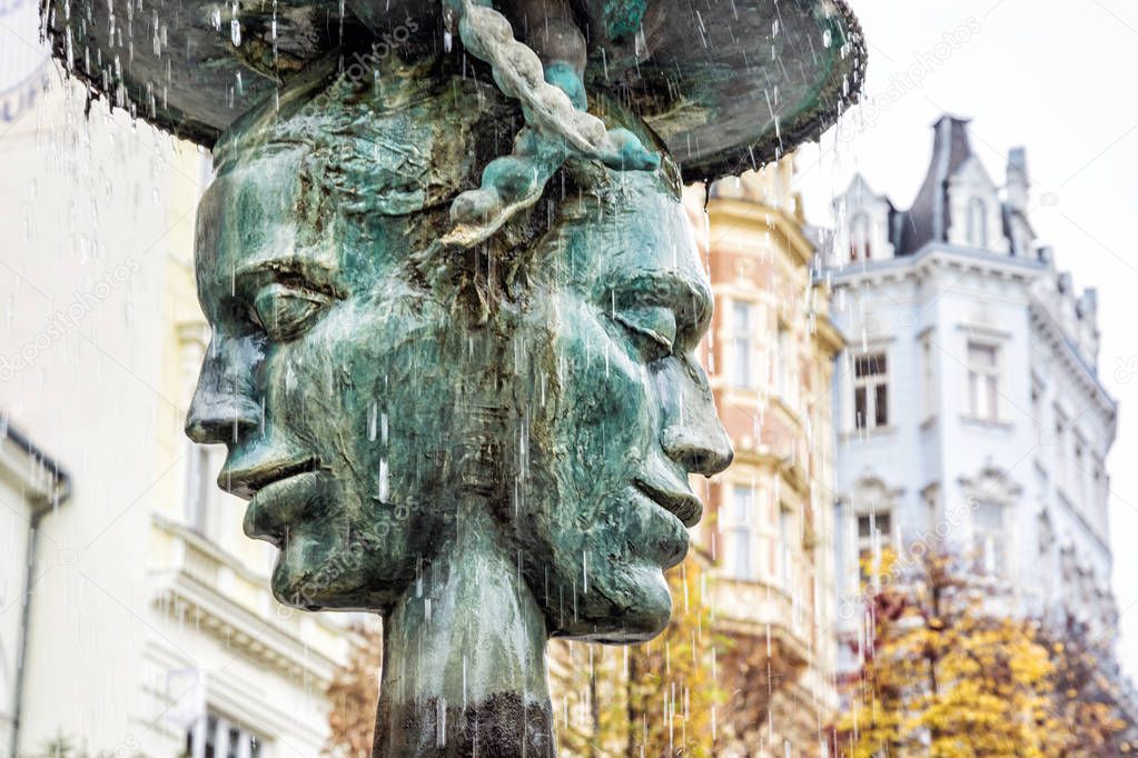 Allegorical sculpture and fountain, Karlovy Vary, Czech republic. Artistic object. Travel destination.