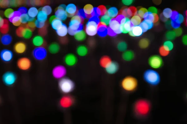 Barevné rozostření bokeh pouliční světlo festival víla, noční rozostření — Stock fotografie