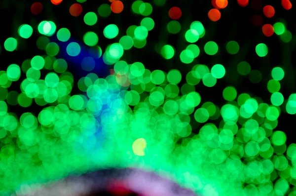 Colorido desenfoque bokeh hadas calle luz festival, noche desenfocada — Foto de Stock