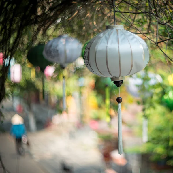Beautiful white and green lanterns in soft and blur style in Hoi An, Vietnam.