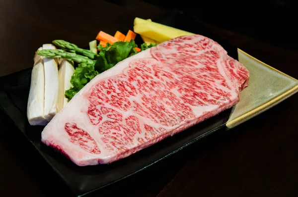 Piece of Wagyu beef striploin steak