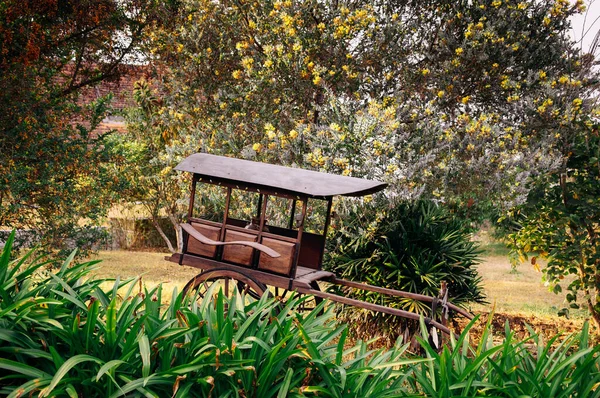 Wooden wagon bullock cart or bullock car in garden - Garden decoration with vintage Asian style wagon