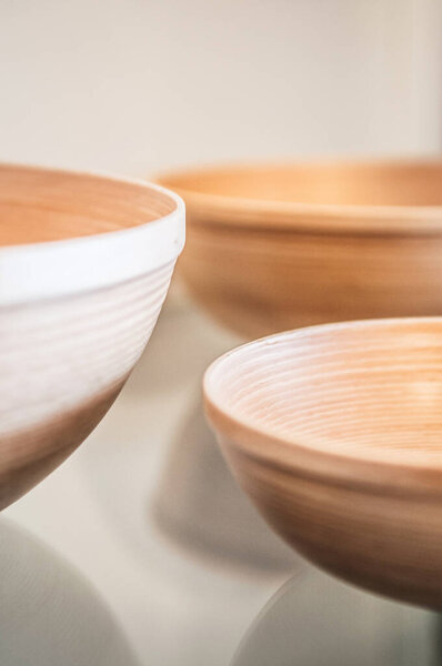 Neat and simple design natural color wooden bamboo bowls close up shot