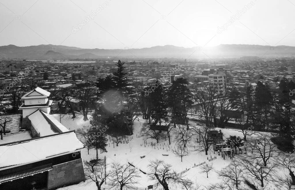 Sunset view of Aizu Wakamatsu city and castle park from aerial angle with beautiful evening light