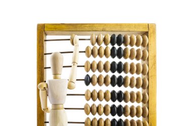 Ahşap manken parlak zemin üzerine ahşap hesap makinesi ile. Ahşap abacus.