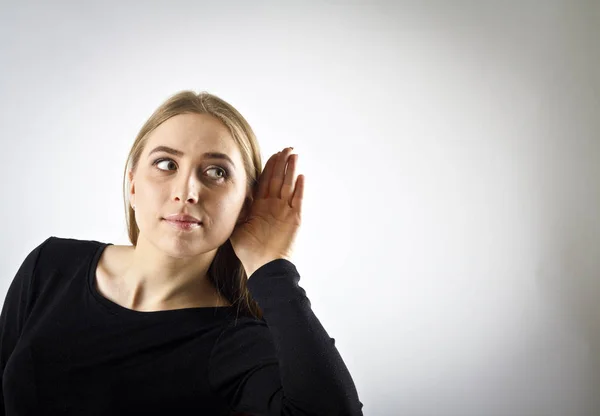 Curious woman in black. — Stock Photo, Image