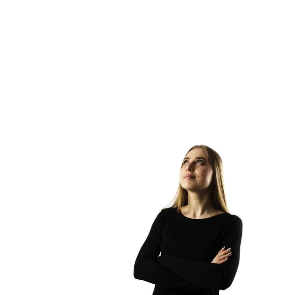 Junge Frau in schwarz auf weißem Hintergrund. — Stockfoto