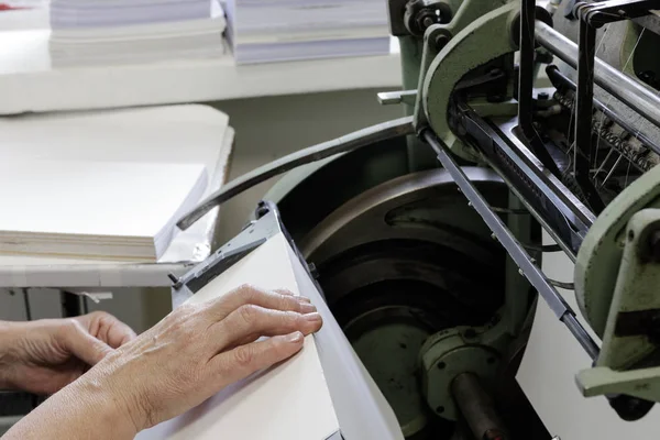 Machine for stitching book pages with threads in typography. — Stock Photo, Image