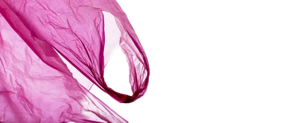 Bolsa de compras de plástico rosa en blanco . — Foto de Stock
