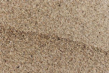 Arkaplan olarak kum dokusu.