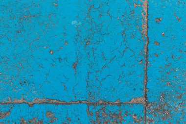 Arka plan olarak asfalt boya. Mavi renk. Park yerinde doku. Sokak.