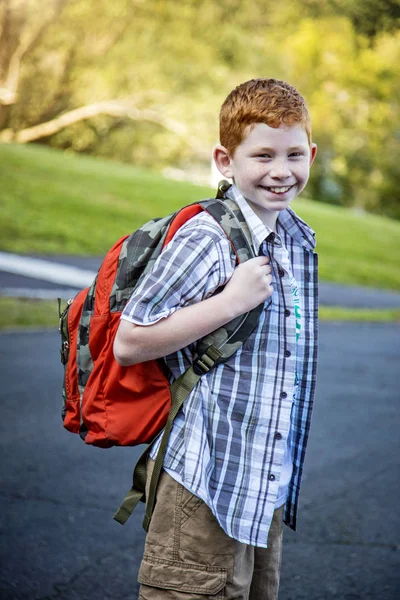 Young Boy Headed School Stock Photo