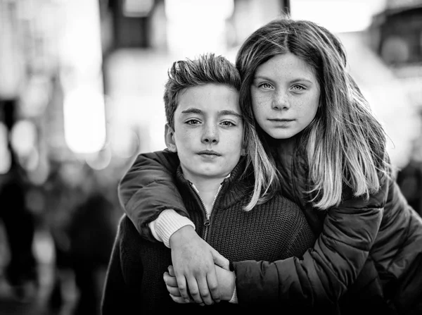 Young Brother Sister Embrace Stock Image