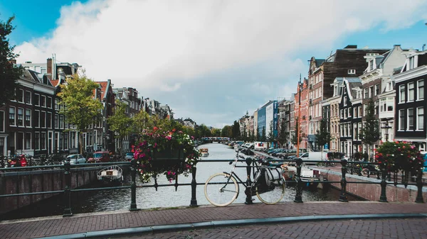 Bicycle on canal bridge in Amsterdam