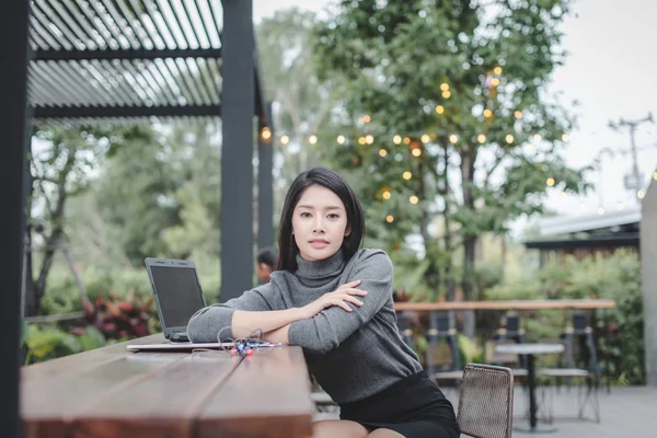 Modern business woman in the coffee shop with copy space