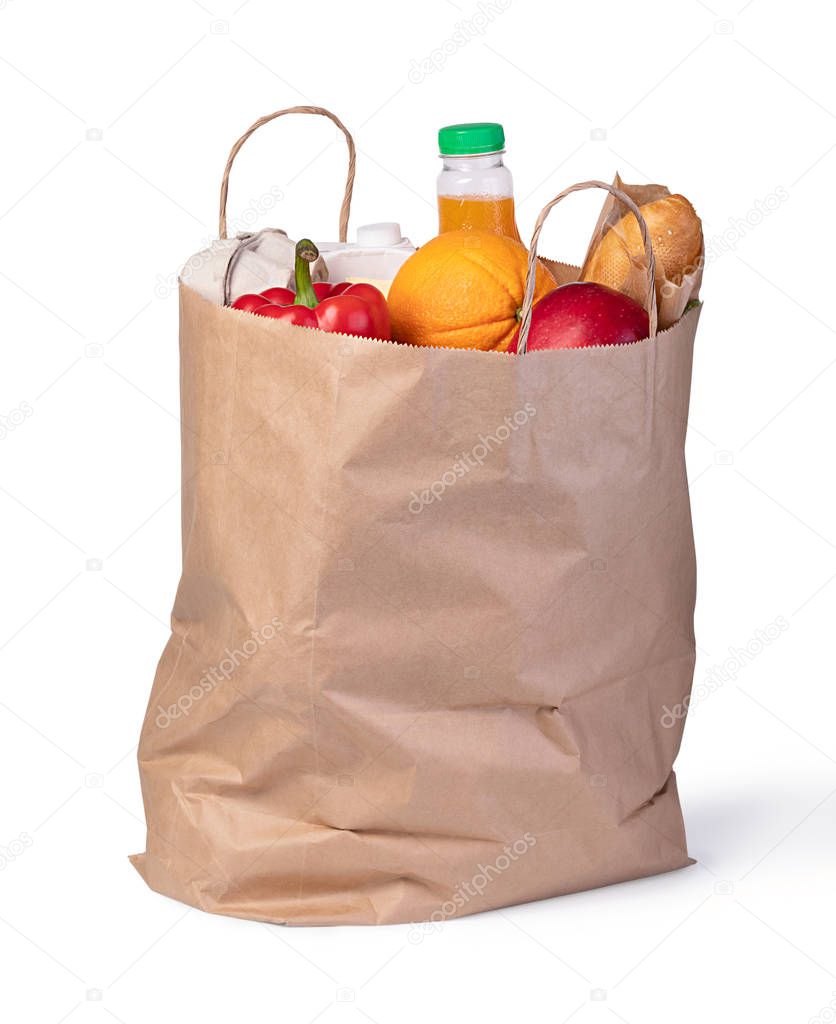 Grocery shopping bag with food isolated on white background
