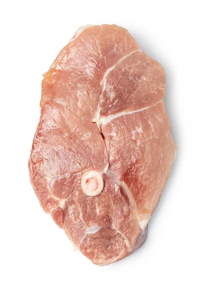 Сирий свинячий стейк ізольований на білому тлі — стокове фото