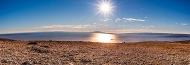 Panorama of Island Cres archipelago before the sunset. View from highest point on island Krk. Winter in Croatia.