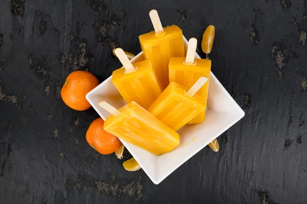 Homemade Tangerine popsicles (zbliżenie) — Zdjęcie stockowe