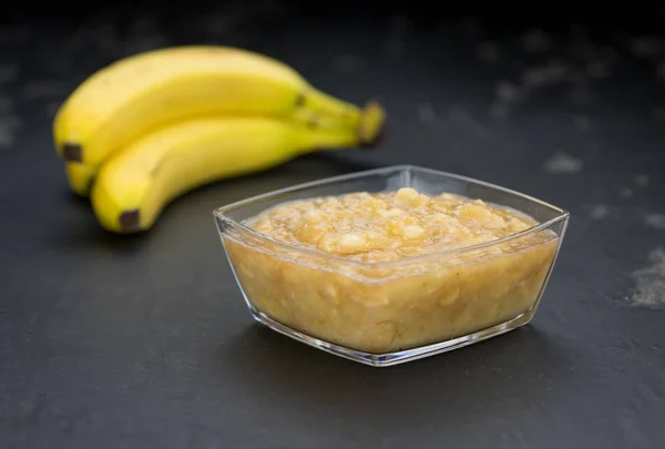 Banana Puree on a slate slab — Stock Photo, Image